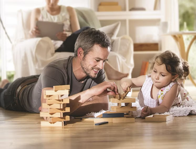 Adult and child playing